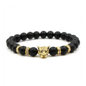 Handgjort armband svart lavasten och guld leopard