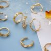 12-pack tåringar ringar justerbar storlek - guld
