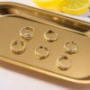 12-pack tåringar ringar justerbar storlek - guld
