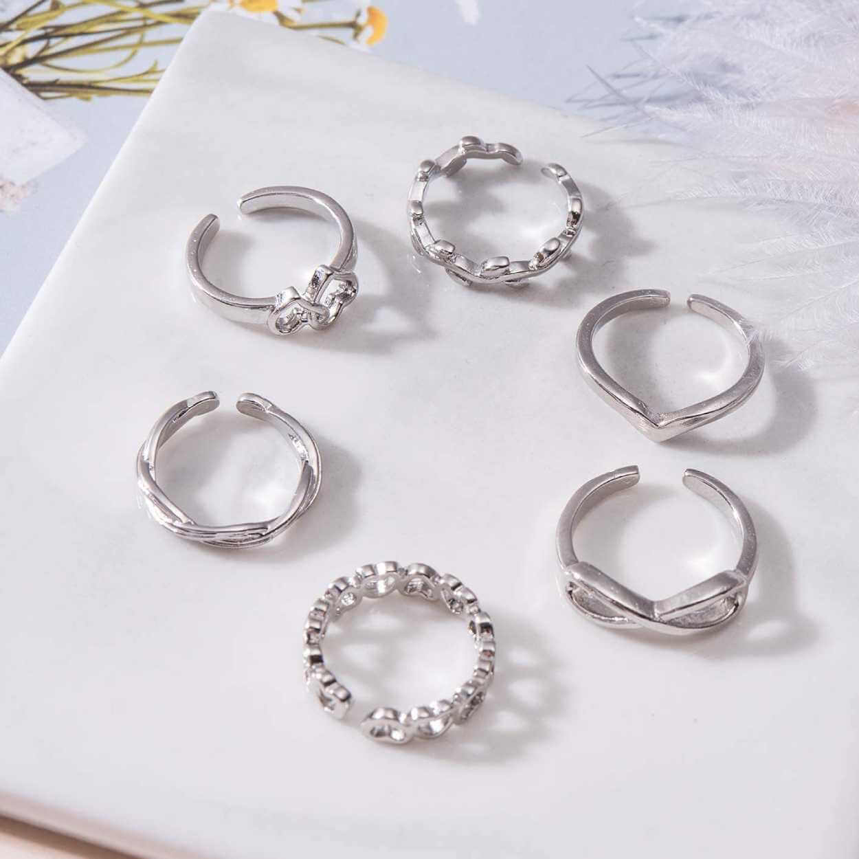 12-pack tåringar ringar justerbar storlek - silver